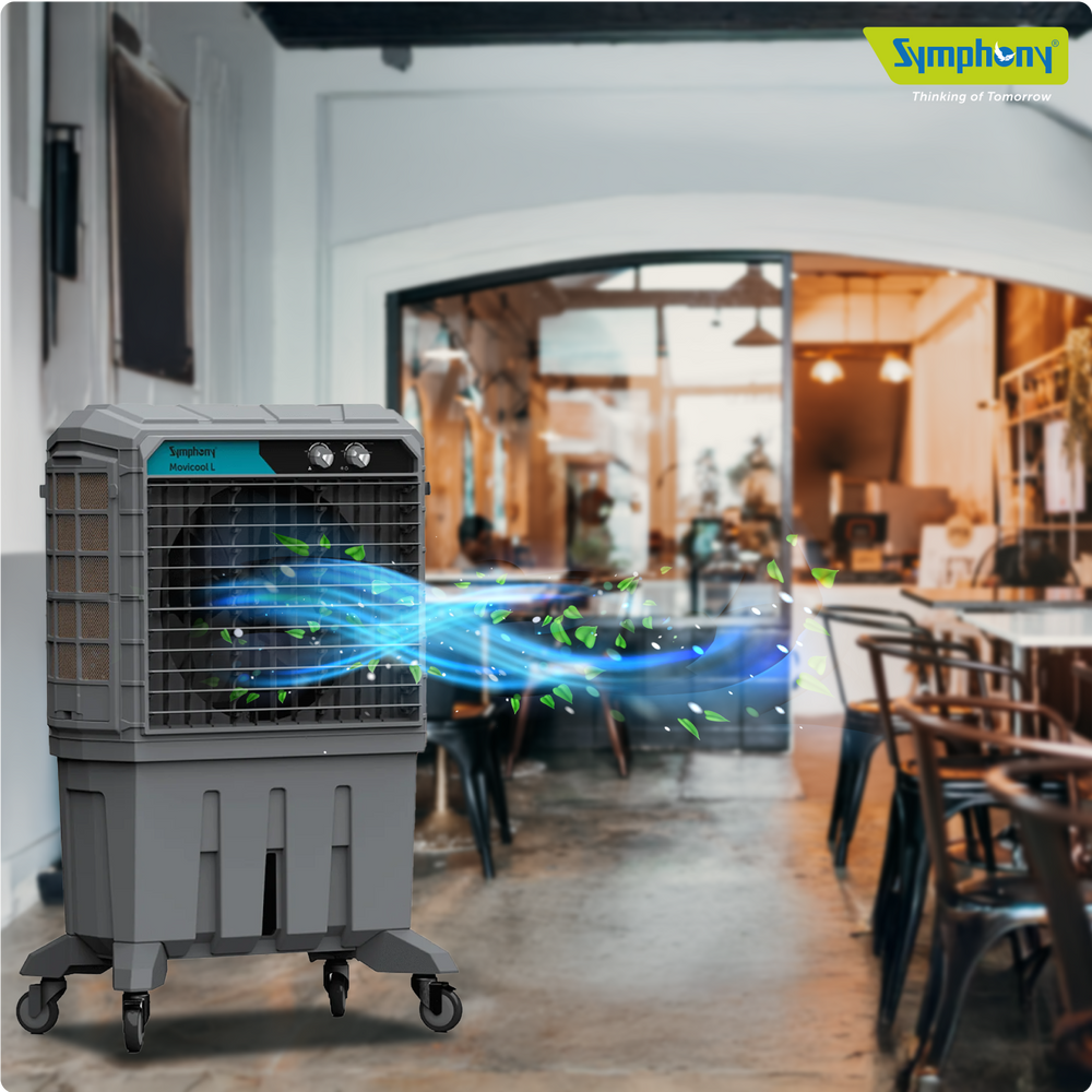 Symphony Movicool L125 cooler shown in a manufacturer illustrative café setting; representative commercial air cooler.